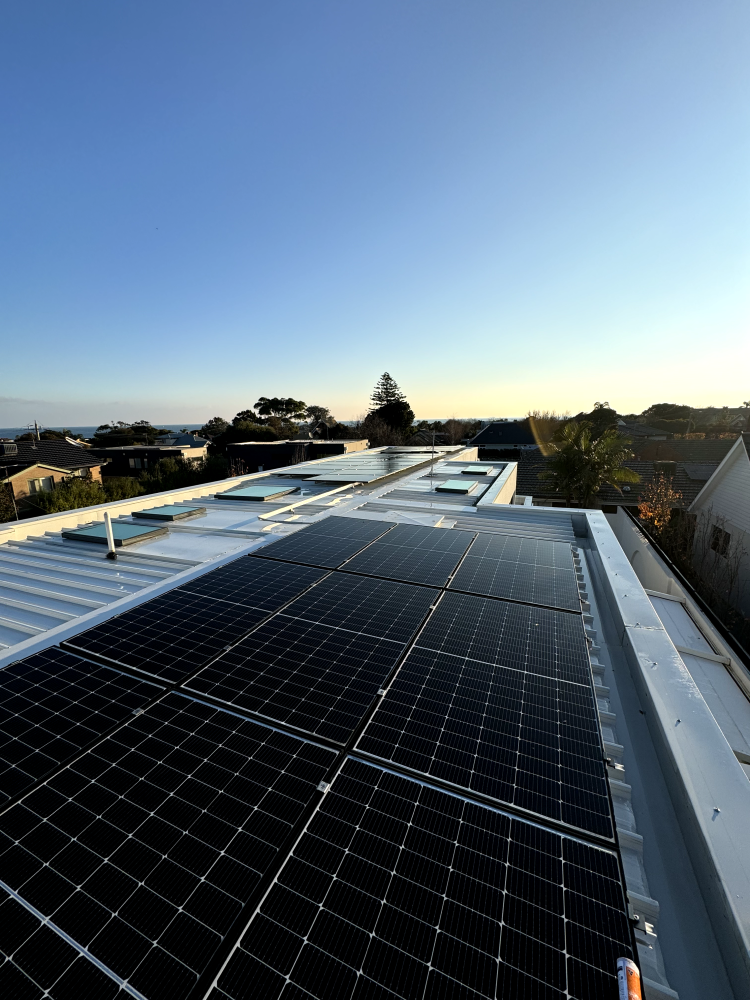 Roof pressure washing Melbourne and solar panels cleaned on a a tile roof