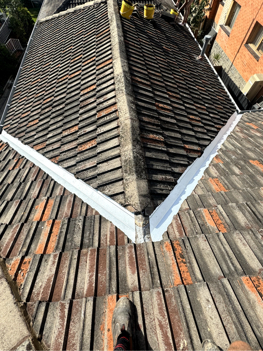 melbourne tiled roof maintenance with repointed ridge cappings